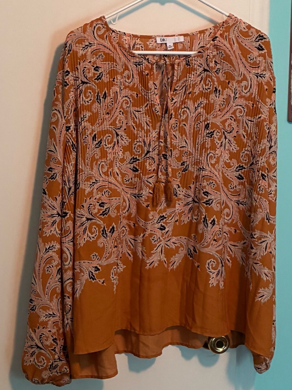 Mustard yellow flowing top with long sleeves. L but can fit 2x